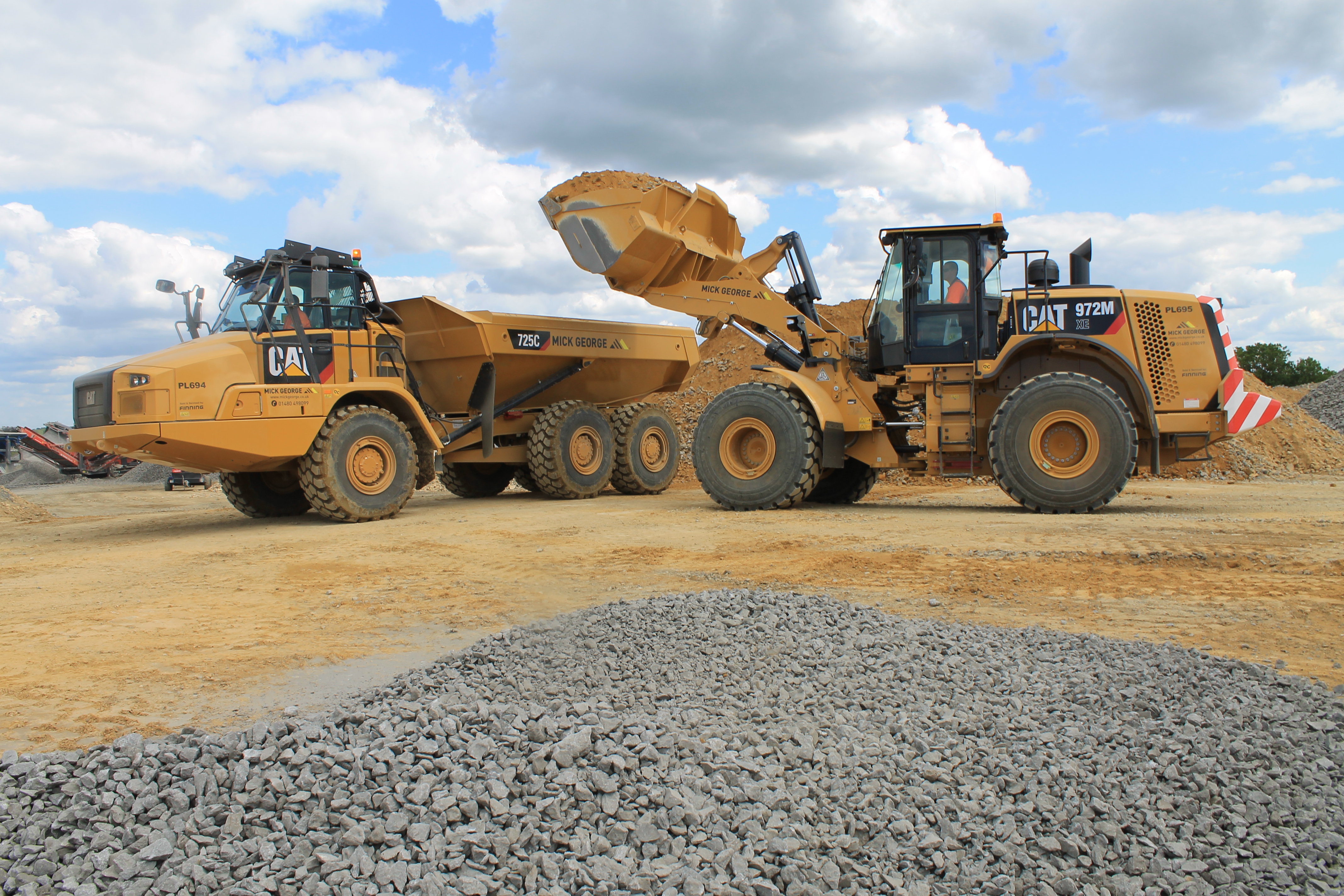 Cat 972M XE wheeled loader and Cat 725C ADT 