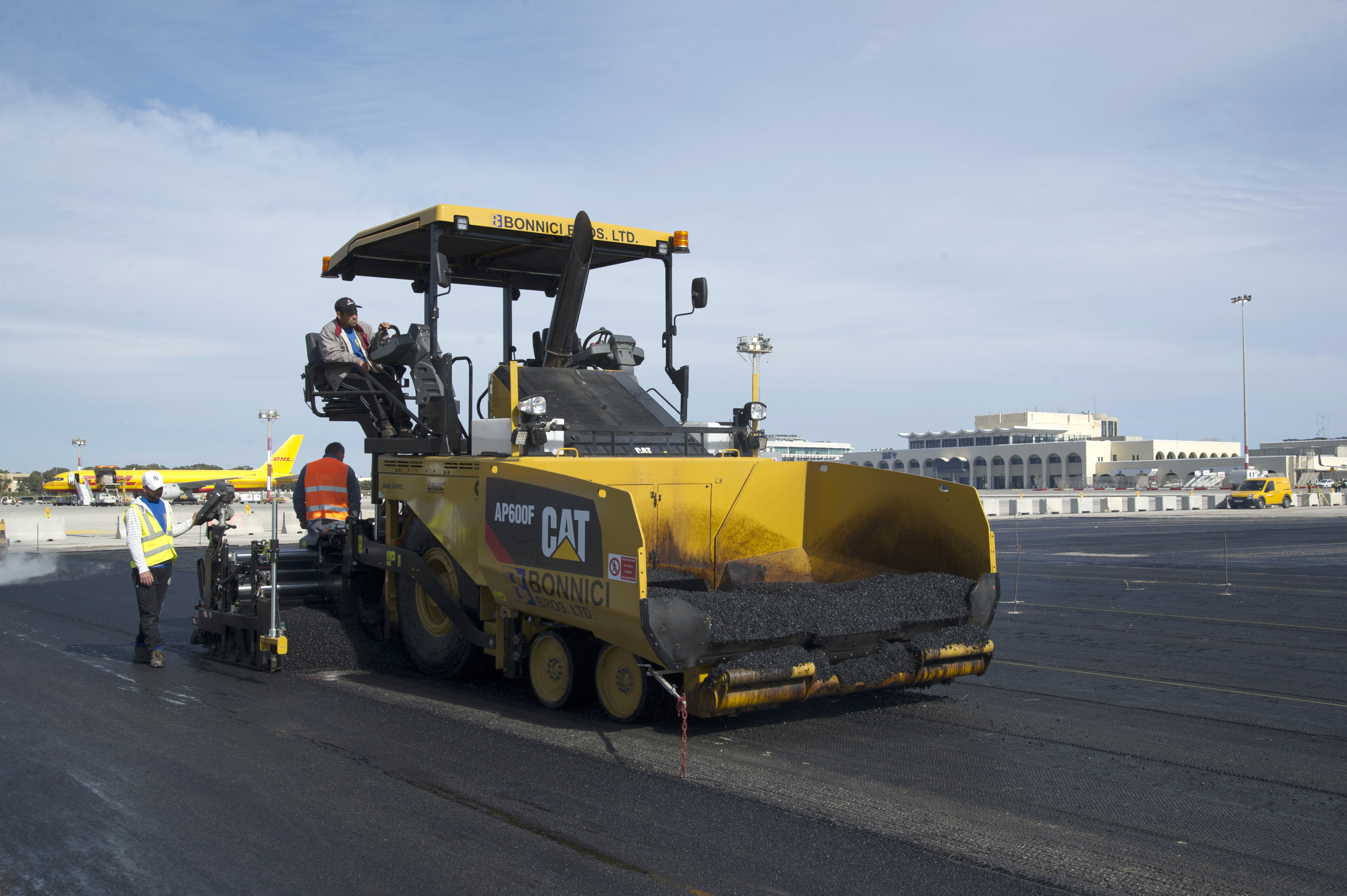 Caterpillar  AP600F paving work