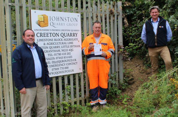 Steve Johnson of Johnston Quarry Group receiving the first OCA with Gavin Brain of EMPI Awards and Mike Phillips of MinTrain