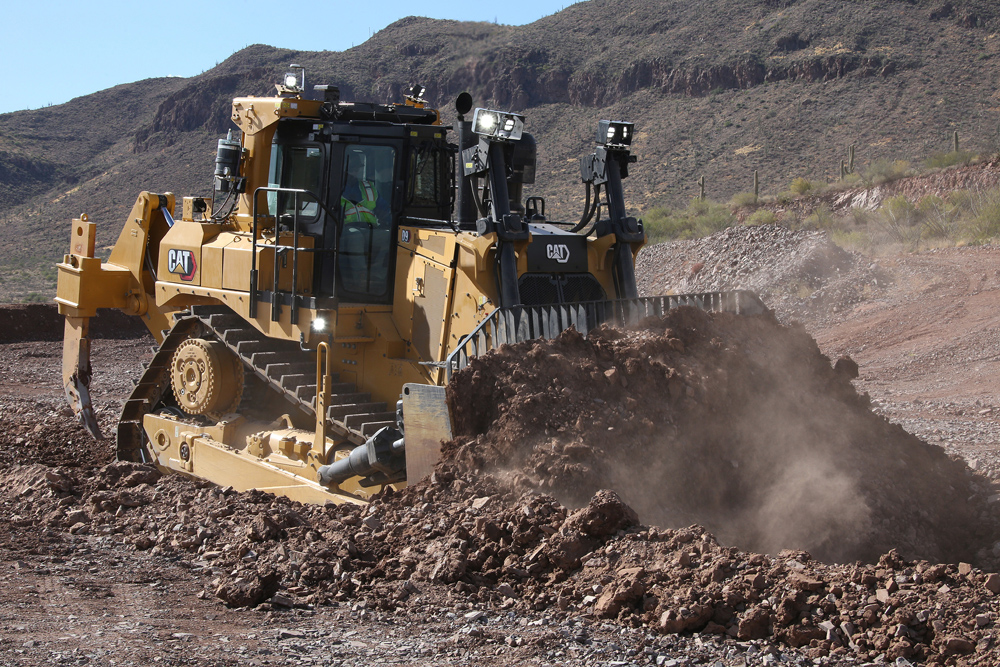 The new Cat D9 dozer pushing dirt