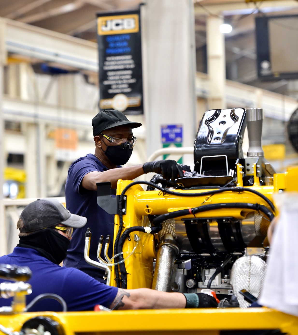 The backhoe loader production line at JCB's HQ in Staffordshire