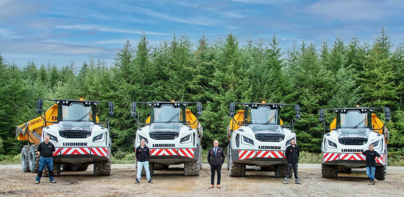  The Mackay dump truck line up complete with drivers (left to right): Grant Sutherland, Gordon Taylor, Eddie Mackay, Jamie Allan and Craig Pirie