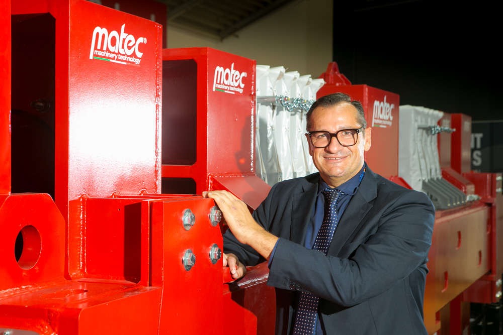 Matteo Goich, Matec Industries CEO, with a prototype of Twin Freccia Rossa, the world’s biggest filter press   