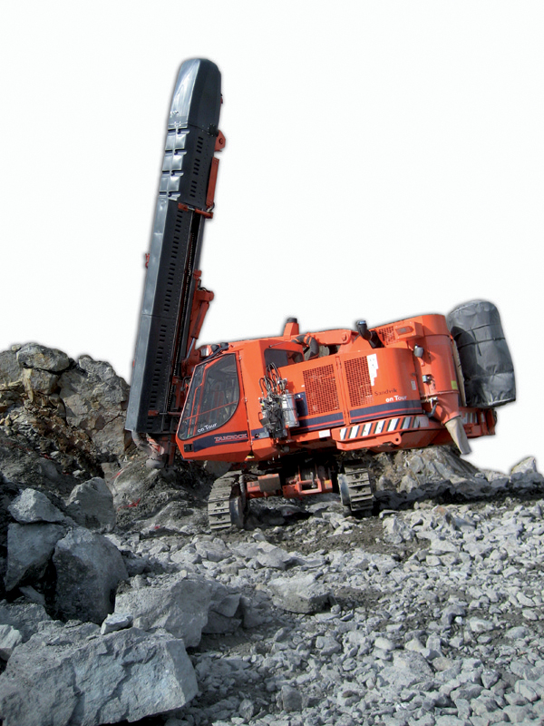 Drill rig drilling in rocks