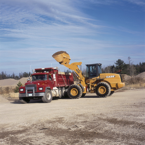 case loader loading a truck