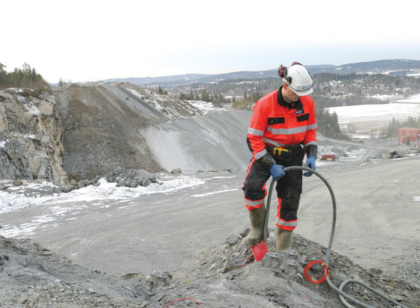 man planting explosives