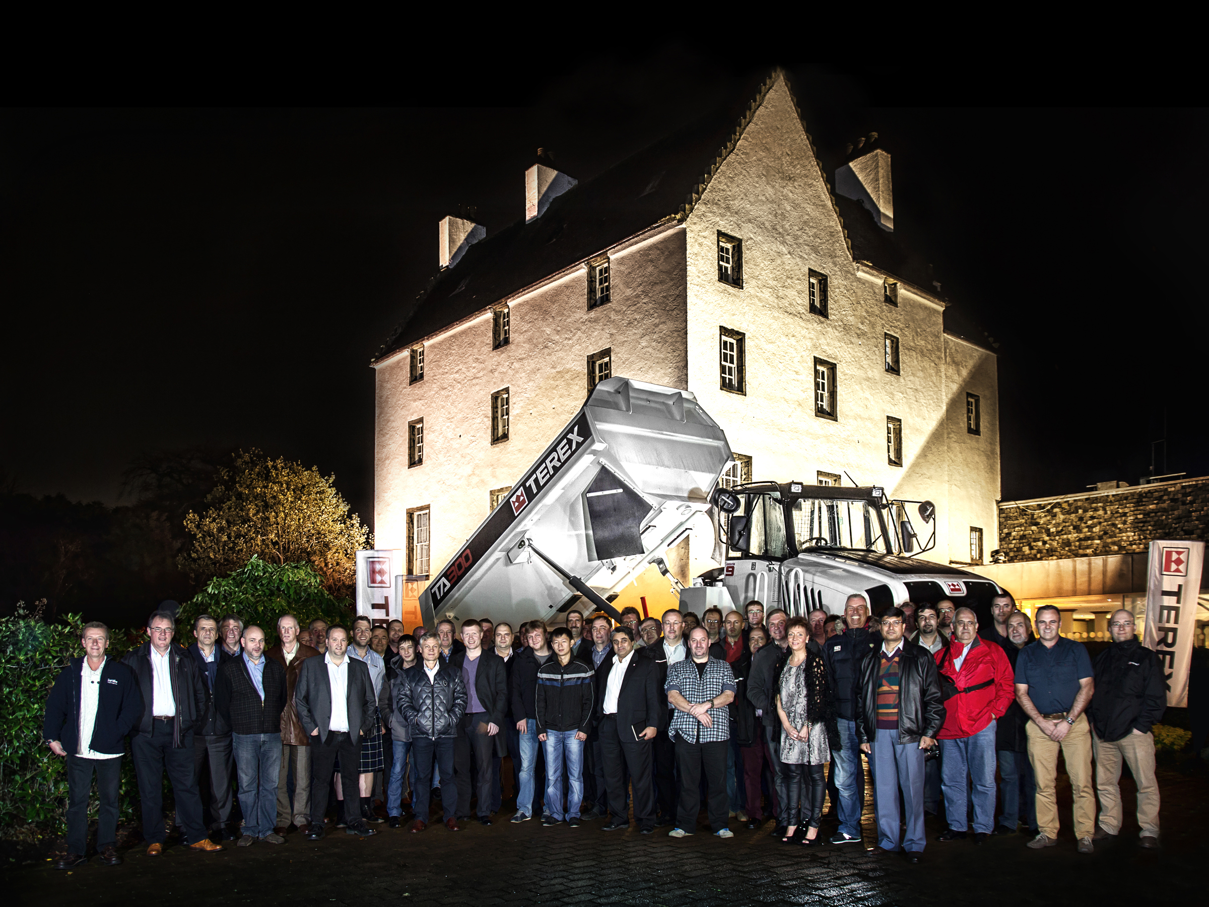 Terex truck days delegates gather in front of a TA300 articulated truck 