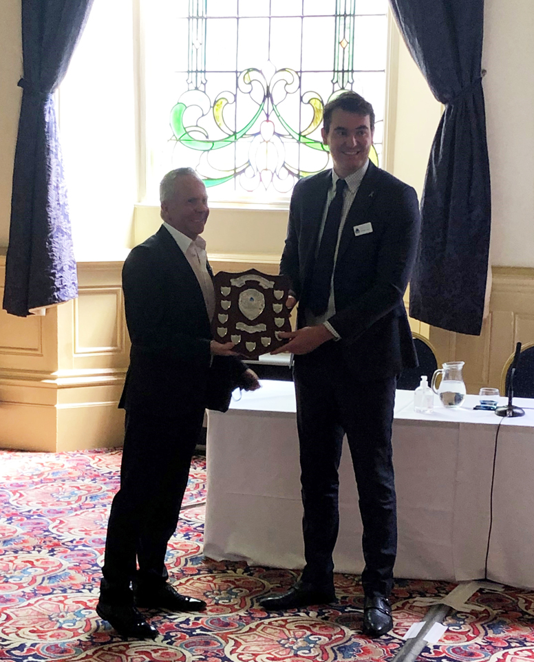 Ben Strickland (right) receiving the BAA Quarry of the Year commemorative shield from Paul McManus, BAA chairman