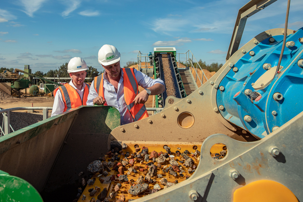 David Kinloch, CDE’s director of Business Development, UK & Ireland, and Oliver Rees, SRC Group managing director (right) take a close-up look at SRC’s new CDE plant at work