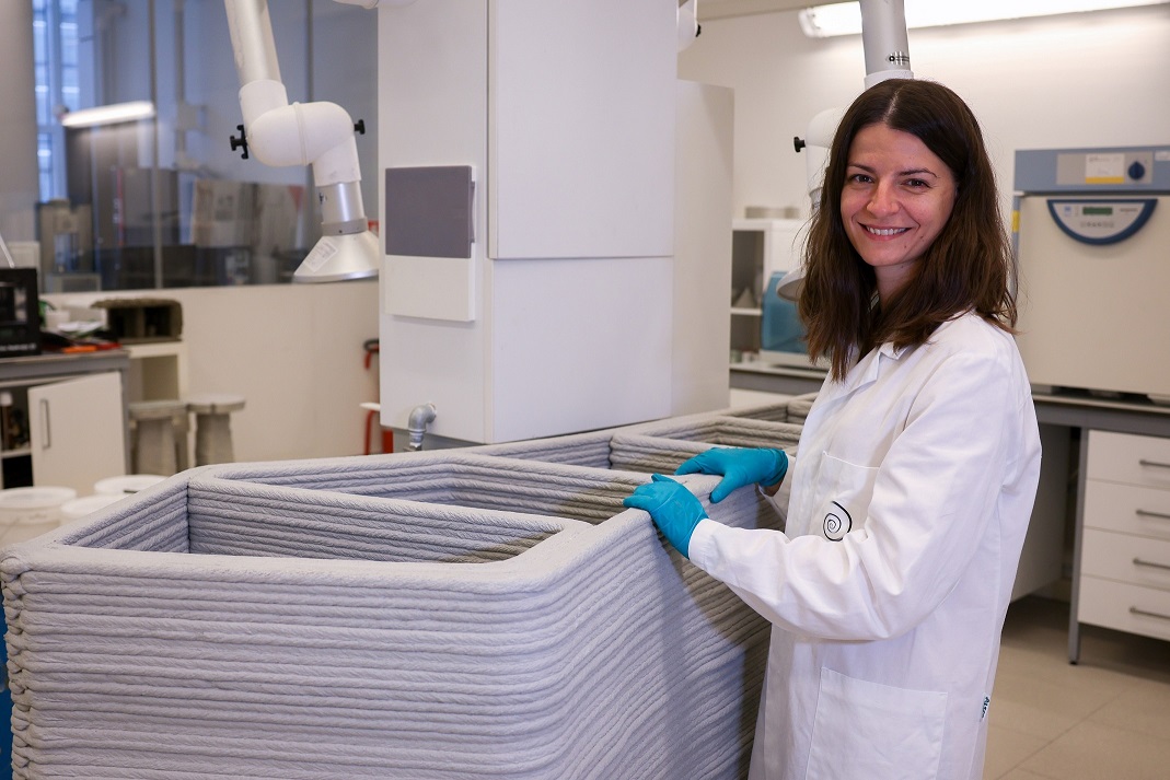 A member of HeidelbergCement's research team developing material forms for 3D printed building techniques