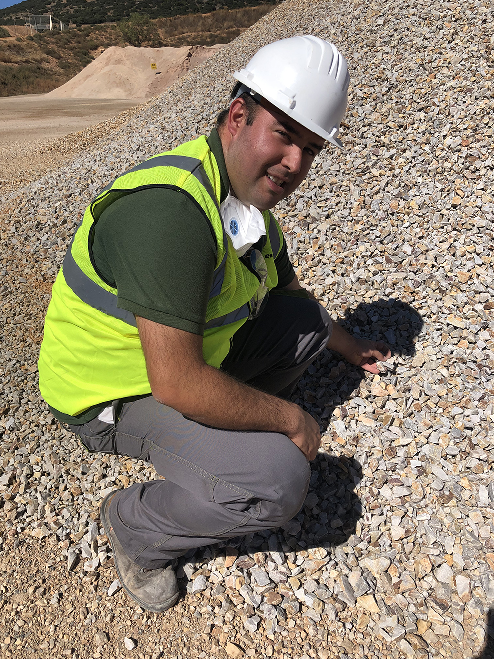 Pablo Perales examines final grade product