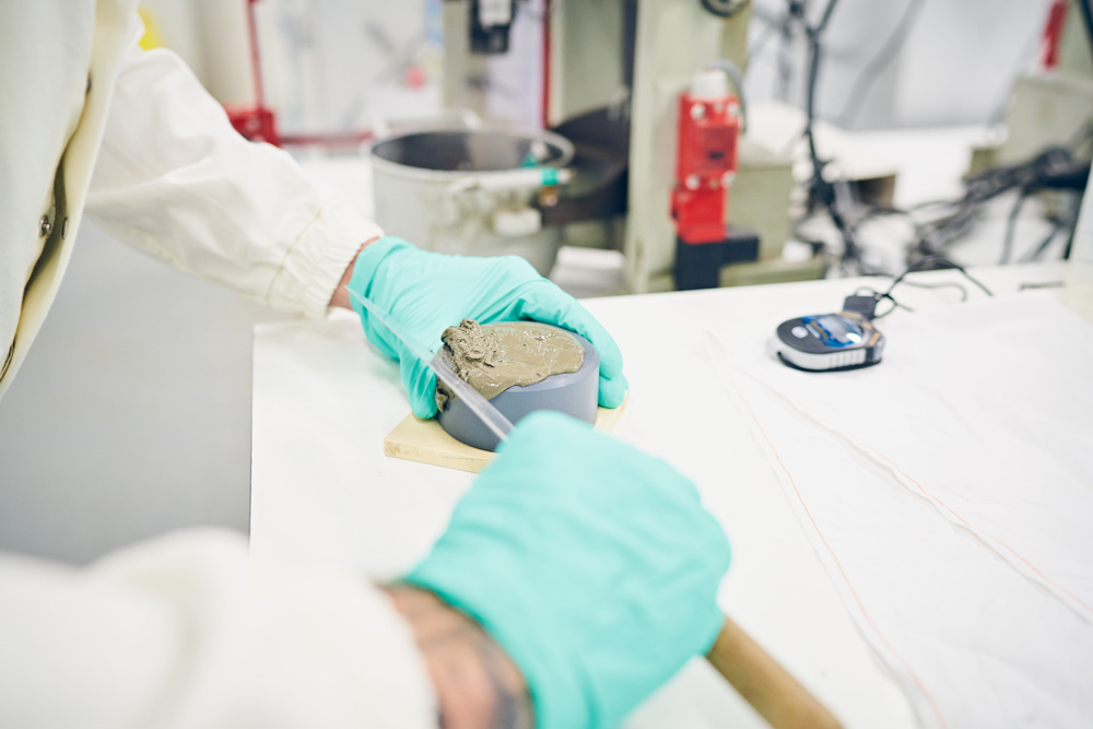 For its 2030 goals, LafargeHolcim is further lowering its target for CO₂ intensity in cement to 475kg net CO₂/tonne of cementitious material. Pictured is a laboratory at the group’s R&D Centre in Lyon, France