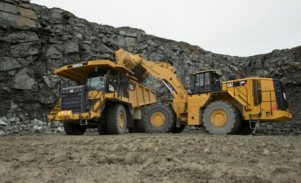 A Cat 988K XE loading a 775G rigid hauler at Kujawy Quarry