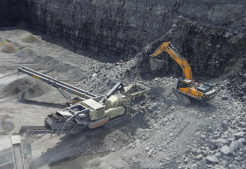 A Metso Outotec Lokotrack LT1213S mobile crusher is loaded by a Hyundai excavator at Castle Quarry Crushing in Galway, Ireland. Image: McHale Plants