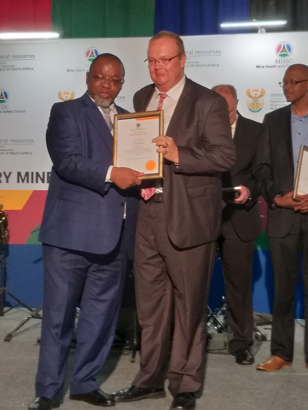 Nico Pienaar receiving a special award from South Africa’s Minister of Mineral Resources in recognition of his valuable and ongoing contribution to the Mine Health and Safety Council