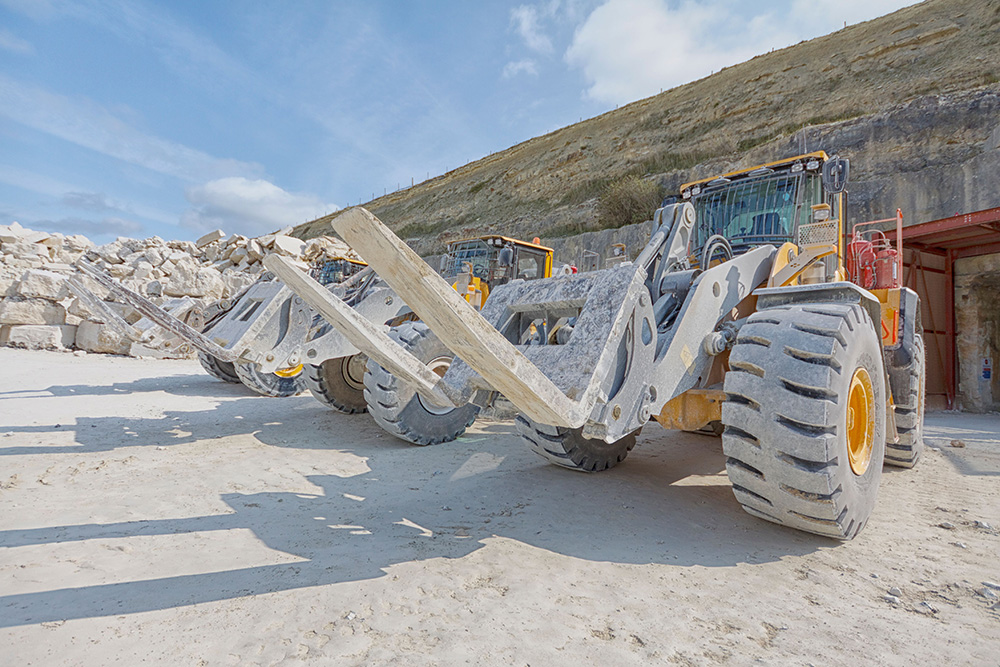 The pricing of powertrain components is key to the success of the electrified off-highway vehicle market, says Alastair Hayfield. Volvo CE is among OEMs investing heavily in electrified off-highway machine R&D. Pictured are Volvo L150H wheeled loaders at Albion Stone on the Isle of Portland, Doreset, southwest England 