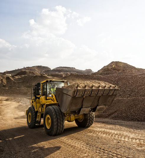 A Volvo L150H wheeled loader at work on a quarry site