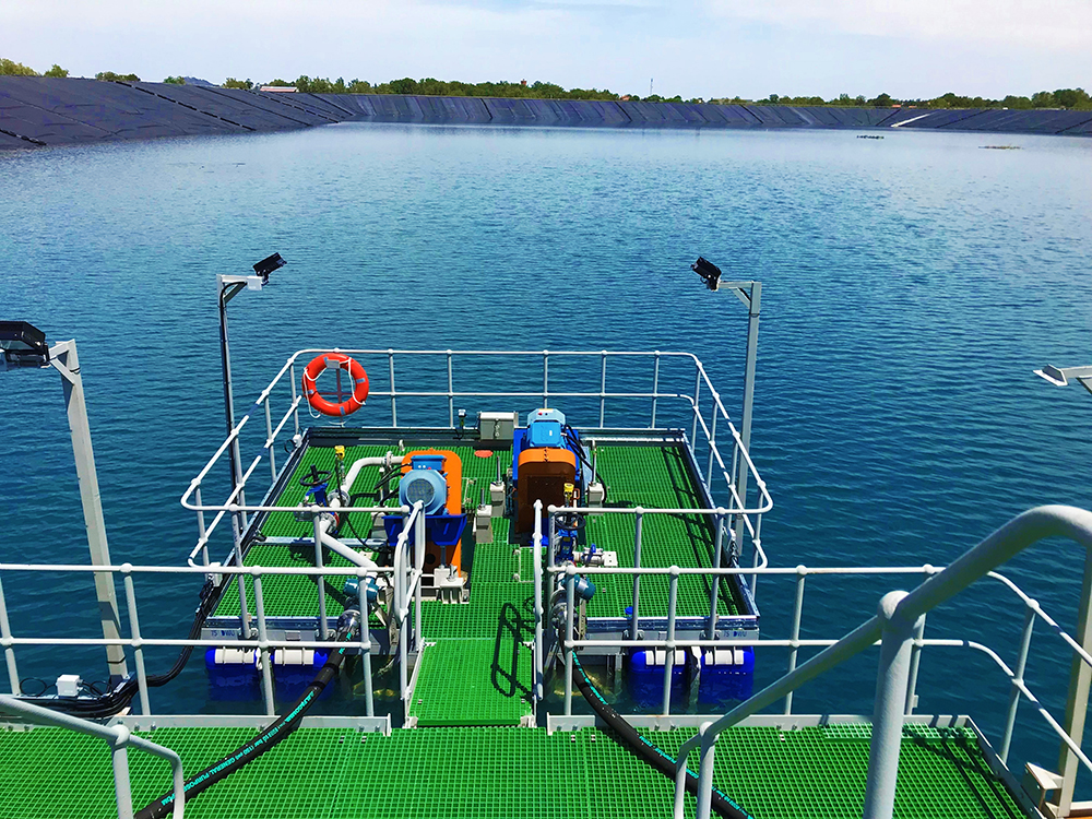 A Weir Multiflo dewatering pontoon barge