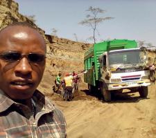 Black sand being loaded at Mai Mahiu volcanic sand mines.jpg