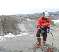 man planting explosives