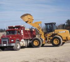 case loader loading a truck