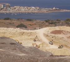 A Chicago Pneumatic RX46 breaker excavates rock in Malta