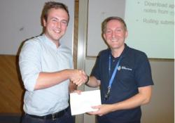 Kieran Blacker receiving the EIG 2014 Scholarship Award