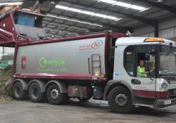 Derbyshire County Council waste vehicle drops off a load 