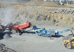 The borrow pit is producing road aggregate