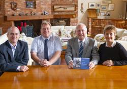 Norman Grundon (holding book) at the launch of The Road from Sand & Gravel.jpg