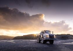 A Terex Trucks TA300 articulated hauler pictured at a Scottish quarry site at sunset