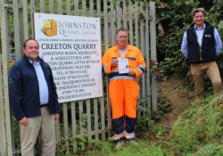 Steve Johnson of Johnston Quarry Group receiving the first OCA with Gavin Brain of EMPI Awards and Mike Phillips of MinTrain