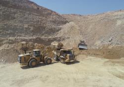 New Cat models at work: a Cat 988K wheeled loader, Cat 772G rigid hauler and Cat D10T2 crawler dozer helping Latomia Latouros process calcareous limestone 