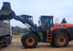 The Mick George Group has received Britain's first new Doosan DL-7 wheeled loaders. Pictured is one of the company’s DL420-7 models