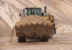 A Cat 988K XE large wheeled loader working at a quarry in Germany