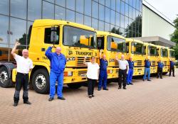 Left to right with the ERF trucks are JCB personnel Phil Pepper, John Morton, Carole Ball, Mark Chatfield, Dustine Poole, Ray Tilley, Andrew Corbett, David Pountain and Darren Carter.