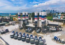  Pan-United mixer trucks at one of its concrete batching production plants