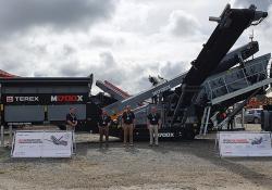 The Terex Washing Systems’ team in front of the M1700X plant launched at the CQMS show in Ireland