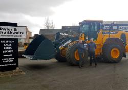 Ian Burton (left), Taylor & Braithwaite sales director, congratulating Chris Jordan, Taylor & Braithwaite North East area sales manager, on becoming Hyundai Construction Equipment European Salesperson of the Year for 2021