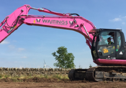 The JCB 'candy pink digger' has so far raised over £100k for cancer charities