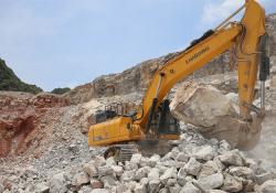 A LiuGong 950E excavator at work in a quarry. Pic: LiuGong