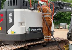 An SMT GB technician refuels a Volvo ECR235E excavator with HVO fuel. Image: SMT GB