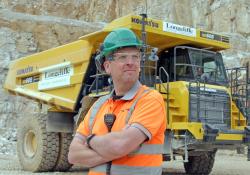 Longcliffe’s Brassington Moor quarry manager Jon Murgatroyd with the new Komatsu dumper. Image: Longcliffe Quarries