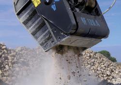 Bucket crusher emptying load 