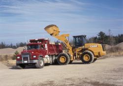 case loader loading a truck