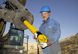 man loading hammer rig