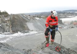 man planting explosives