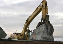 Shifting aggregate for use in coastal defenses in Wales