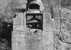 An early steam-driven single roll crusher