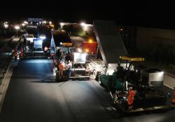 Resurfacing the A99 near Munich after dark